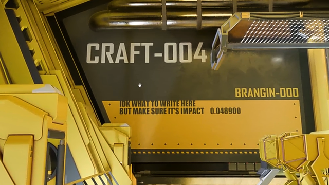 Inside of the Pioneer in a crafting room, on a wall is written 'idk what to write here but make sure it's impact 0.048900'