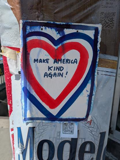 A sign that says Make America Kind Again
