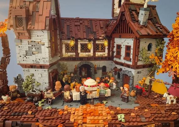 a model of a medieval inn made of Lego bricks