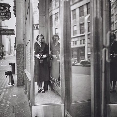 Vivian Maier , Photographer 1950's New York streetlife. 
In this photo using a favorite: Mirror-effect in shopping- windows