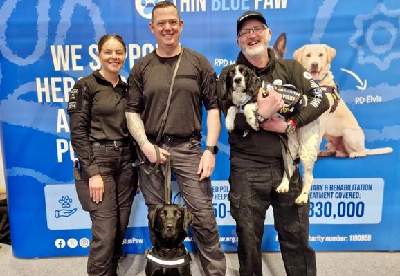 Officers and dogs at the Thin Blue Paw stand at Crufts