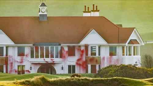 Photo. Club house at Turnberry golf course, Scotland. Red paint had been sprayed all over the facade. An act of resistance against the fascist owner.