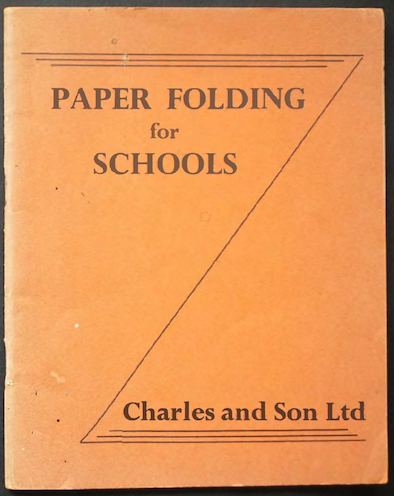 The cover of an old booklet titled ‘Paper Folding for Schools’ published By Charles And Son Ltd . The cover is orange and has a Z-shaped motif.