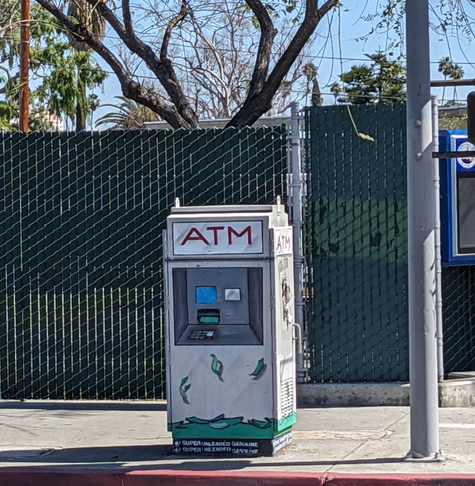 Utility box painted as an ATM