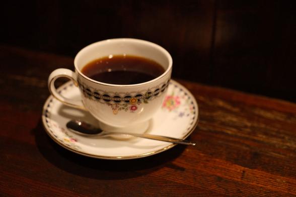 White coffee mug with decoration.