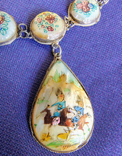 Close up of horseback rider motif