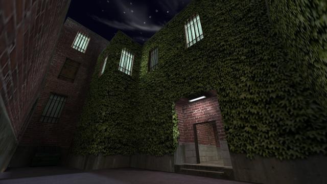 In this picture you can see the previously mentioned alley. And the ringang to the big brick house. Above this is a white illuminated lamp. This is on the map cs_backalley in the game Counter-Strike 1.6.