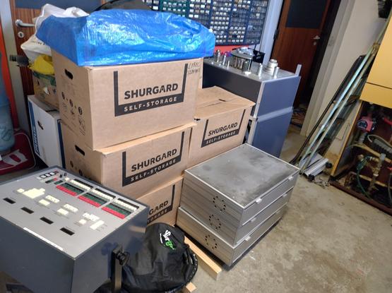 A 24 track reel to reel machine with controller and some boxes