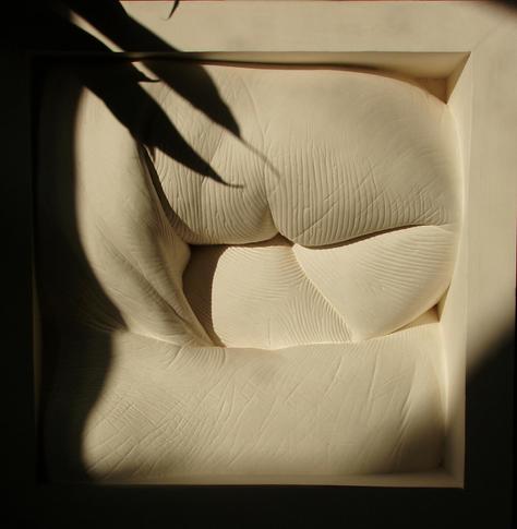 Sculpture, animated by dramatic morning shadows.