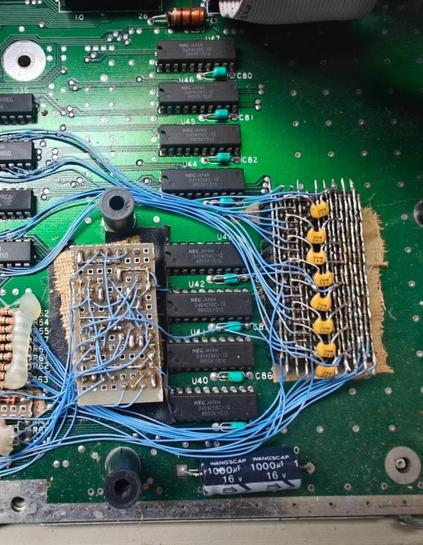 Picture(s) of an Atari ST motherboard sporting a very "handmade" looking RAM upgrade