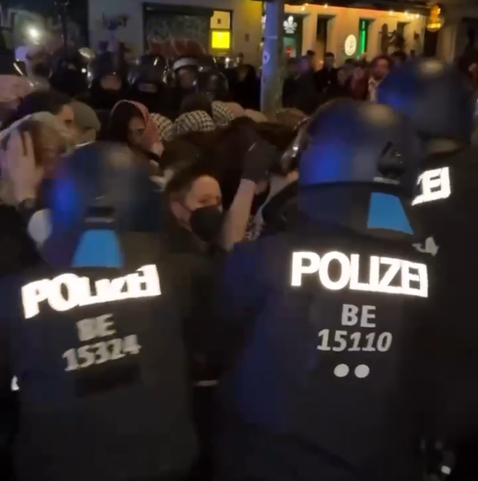 German Police kicking demonstrators on int. women day.