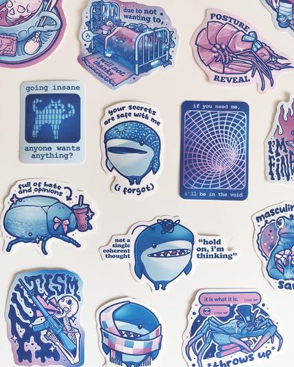 photo of my many stickers with cute animals, skeletons and relatable quotes