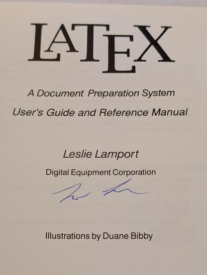 Autographed cover page of Lamport's LaTeX2e book