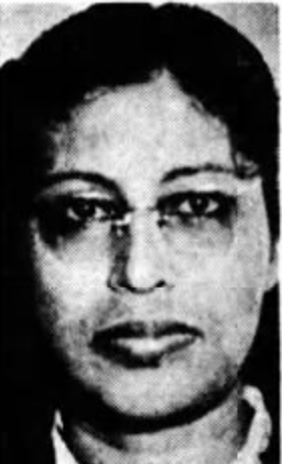 Latifah Bee Ghows, from a 1952 Australian newspaper; a woman with brown skin and dark hair, wearing glasses