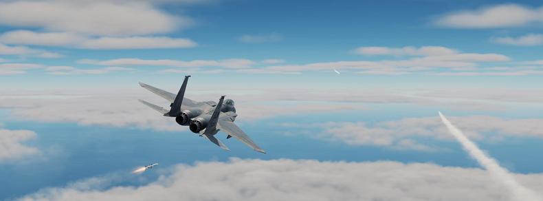 Screenshot from DCS, F-15 fighter flying high altitude above the clouds in the sky blue and the ocean. The F-15 has fired two AIM-120 missiles at a target contrailing a white trail behind it. One of the missiles has just lighted, the other one has made some distance already and has a white plume of smoke trailing behind it.
