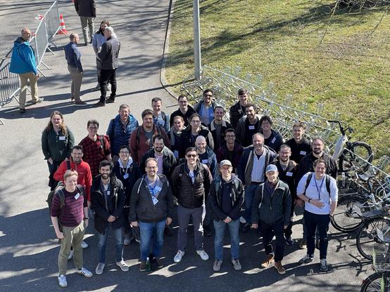 Majority of all participants to the hackathon gathered for a photo at the CERN.