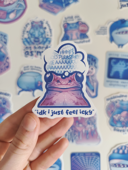 hand holding up a sticker of a purple frog experiencing absolute chaos of thoughts but saying "idk i just feel icky"
