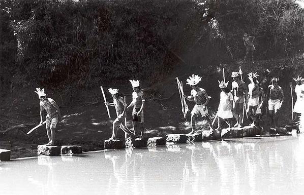 photo - historic - tribal members crossing a river, Southern Brazilian Highlands
