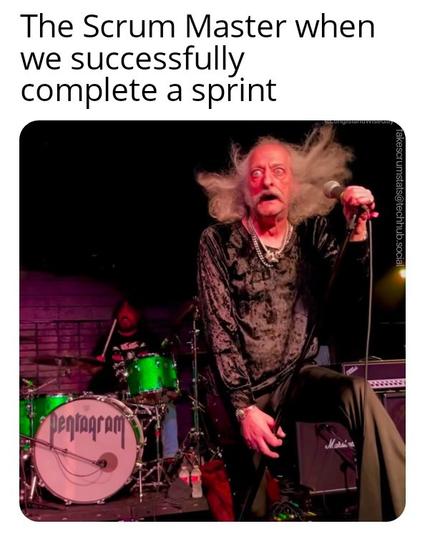 The image shows Bobby Liebling, the lead singer of the American doom metal band Pentagram, performing on stage. 
Key points about Pentagram and Bobby Liebling:
Pentagram is considered one of the pioneers of doom metal, formed in the early 1970s. 
Bobby Liebling is the only constant member throughout the band's history. 
The band has gone through numerous lineup changes. 
Pentagram released their debut album in 1985 after many years of demos and singles. 
Despite challenges, including Liebling's personal struggles, the band has continued to perform and release music. 

Caption: The scrum master when we successfully complete a sprint