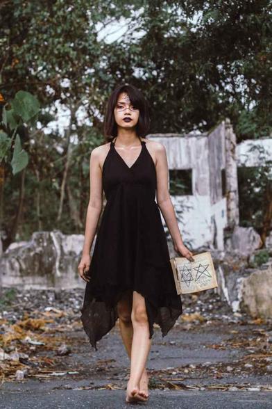 woman wearing black dress