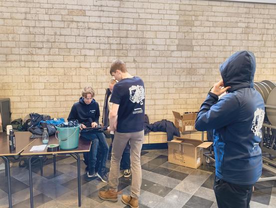 Ulyssis jackets being handed out