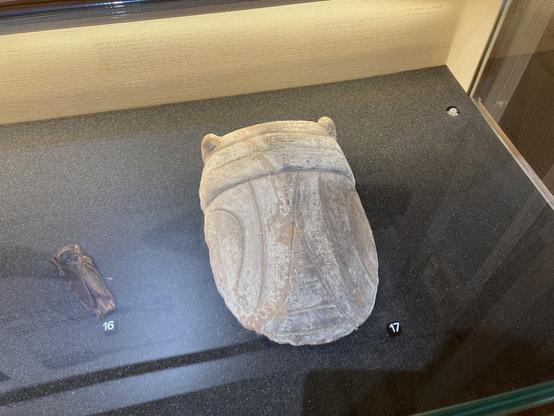 A fairly large-sized (just like a large dish) earthenware, in the shape of a cicada.