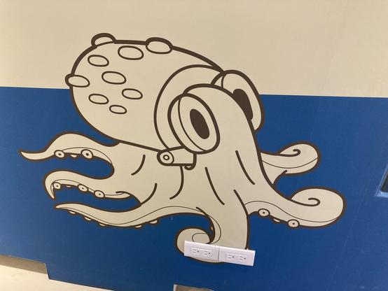 A cute, cartoonish looking illustration of an octopus.