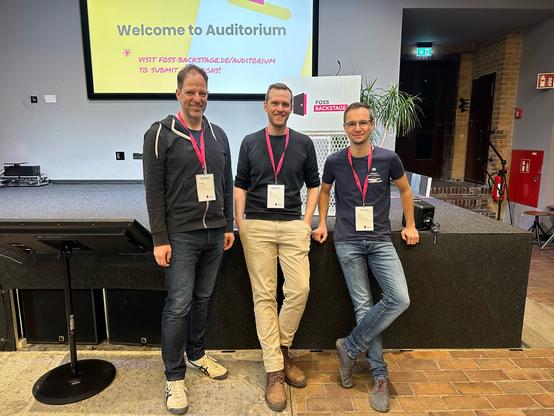 Max, Cornelius and Carsten photographed in front of the main stage of Foss Backstage (Auditorium)