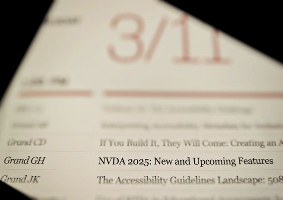 Photo of the CSUN brochure with NVDA 2025: New and Upcoming Features in Grand GH highlighted