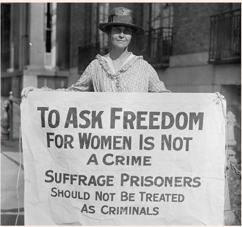 To ask freedom for women is not a crime- suffrage banner last century