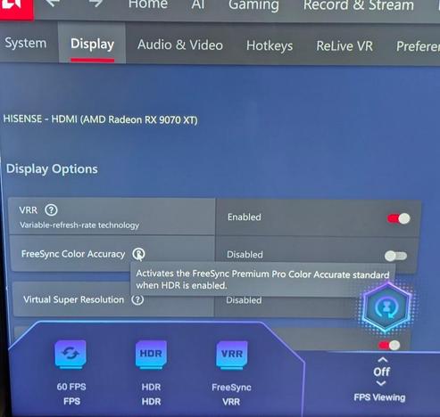 Disabled "FreeSync Color Accuracy" setting in AMD Adrenaline software on Windows 11.  The tooltip text for the setting reads "Activates the FreeSync Premium Pro Color Accurate standard when HDR is enabled."

The TV's menu UI is visible at the bottom of the photo, showing both HDR and FreeSync enabled.
