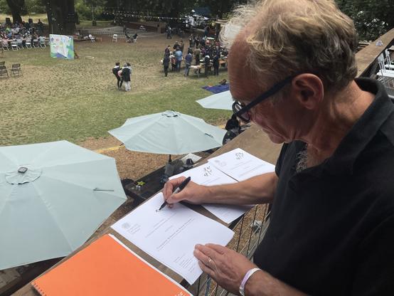 Tim Berners-Lee autographing my thesis.