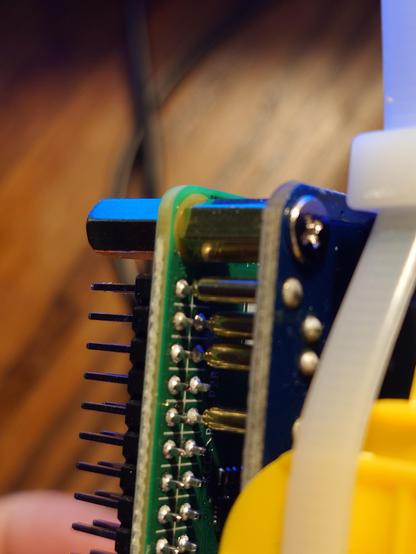 closeup of pogopins connect to pi 4 gpio pins