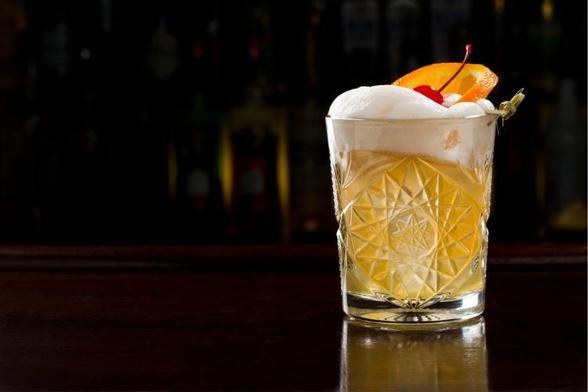 A glass of Irish whisky sour.