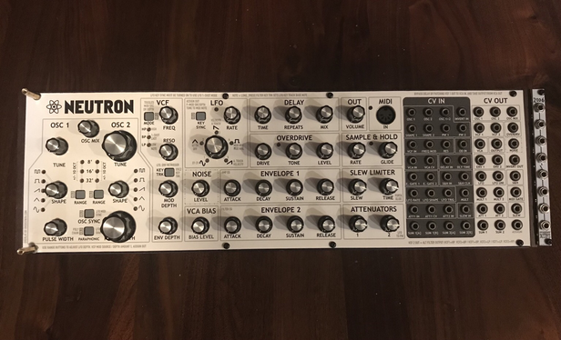 A Behringer neutron with an extension on the right side, a 3u, 2hp multiple.