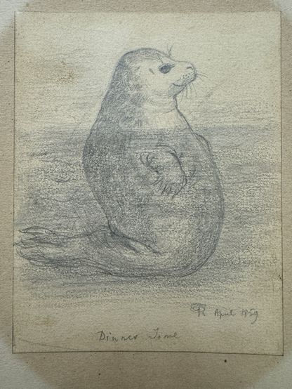 closeup photo of the artwork (small pencil drawing on a vertically oriented rectangular piece of paper, slightly yellowed and stained with age) mounted on another piece of paper