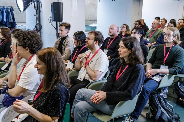Attendees listening to a talk