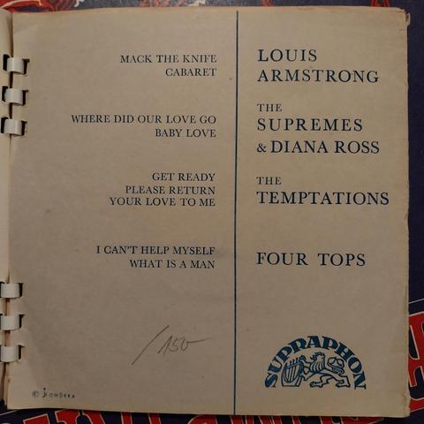 Inside of the four SP vinyl pack with song listing