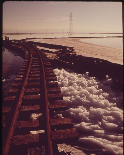 1970s photo of hazardous waste along railroad tracks in the South Bay