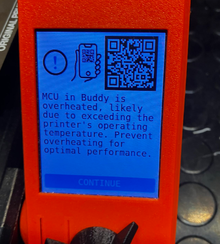 Prusa MINI display showing "MCU in Buddy is overheated, likely due to exceeding the printer's operating temperature. Prevent overheating for optimal performance"