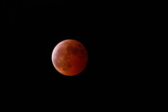 A photo of the lunar eclipse blood moon March 13-14 2025