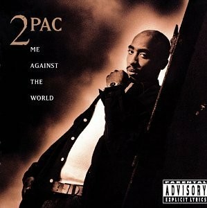 Cover art for the Tupac Me against the World album. Tupac is leaning on a wall wearing a black shirt.