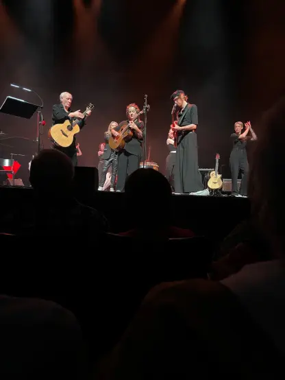 Herman van Veen and Edith Leerkes with son and daughter on stage