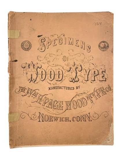Image of the black engraved title on light brown page from _Specimens of Wood Type, Manufactured by Wm. H. Page Wood Type Co., Norwich, Conn._ (1878); held in the ATF Library Collection at Rare Books &amp; Manuscripts Library, Columbia University.