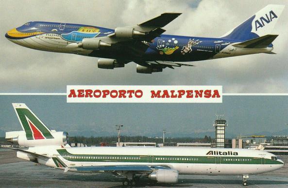 At the top of the postcard is the ANA 747 Flying. The bottom of the card had the Alitalia MD-11 taxiing by the terminal
