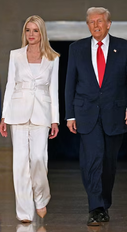 Pam Bondi & Trump made a dramatc showbiz runwayesque entrance to the DOJ dais