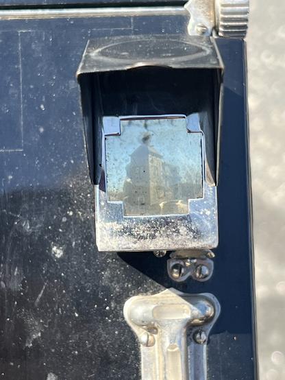 View of the club building in the viewfinder. This is a little cloudy but is better than it was after cleaning off the silvered mirror inside from 100+ years of dust and grime.