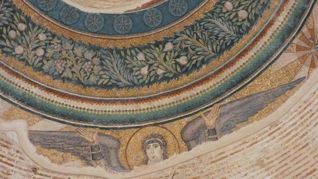 mosaic decoration on the dome of the rotunda: plants (fig, vines, pomegranates..) and a winged angel, hands raised in prayer