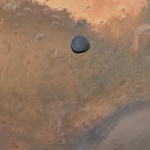 Deimos_Over_Mars,_Terra_Sabaea_-_ESA_Hera_Mission_(54386120493).jpg