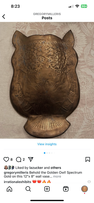 The owl is made of many abstract stitches, which are only slightly obscured by the application of thee coats of Gold glaze